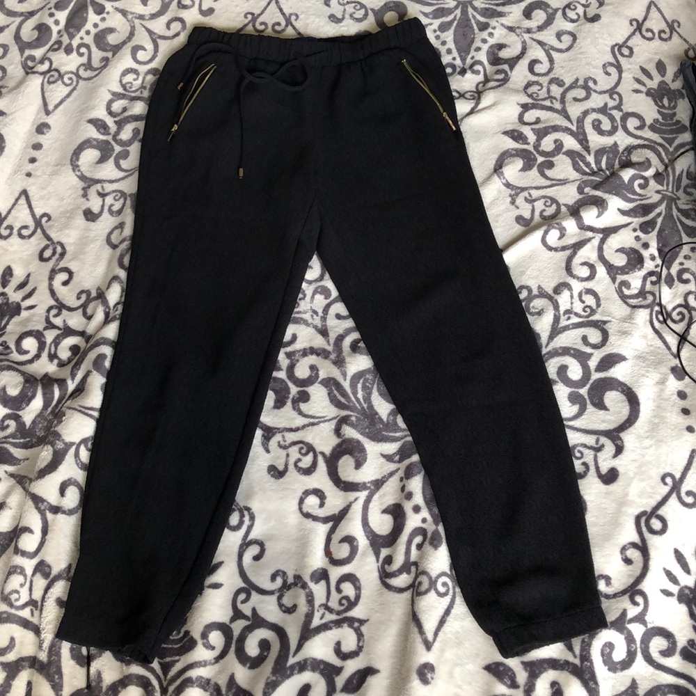 Black apt. 9 joggers with gold colored zippers